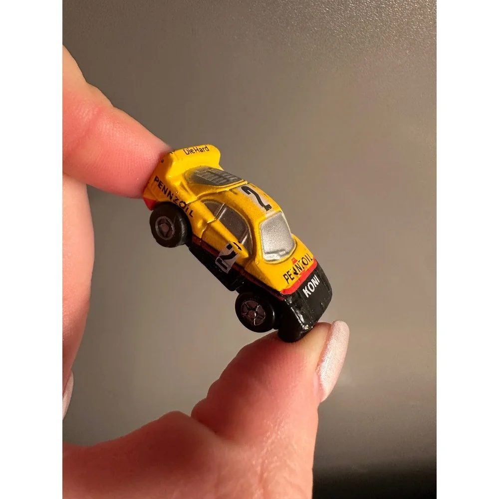 Small Micro Machine Race Car F-40 Yellow & Black # 2 (Snap Back) A Pull Back Toy
